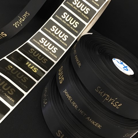 Promotieartikel lint Juwelier Suus zwart satijnen lint met goud glanzende bedrukking